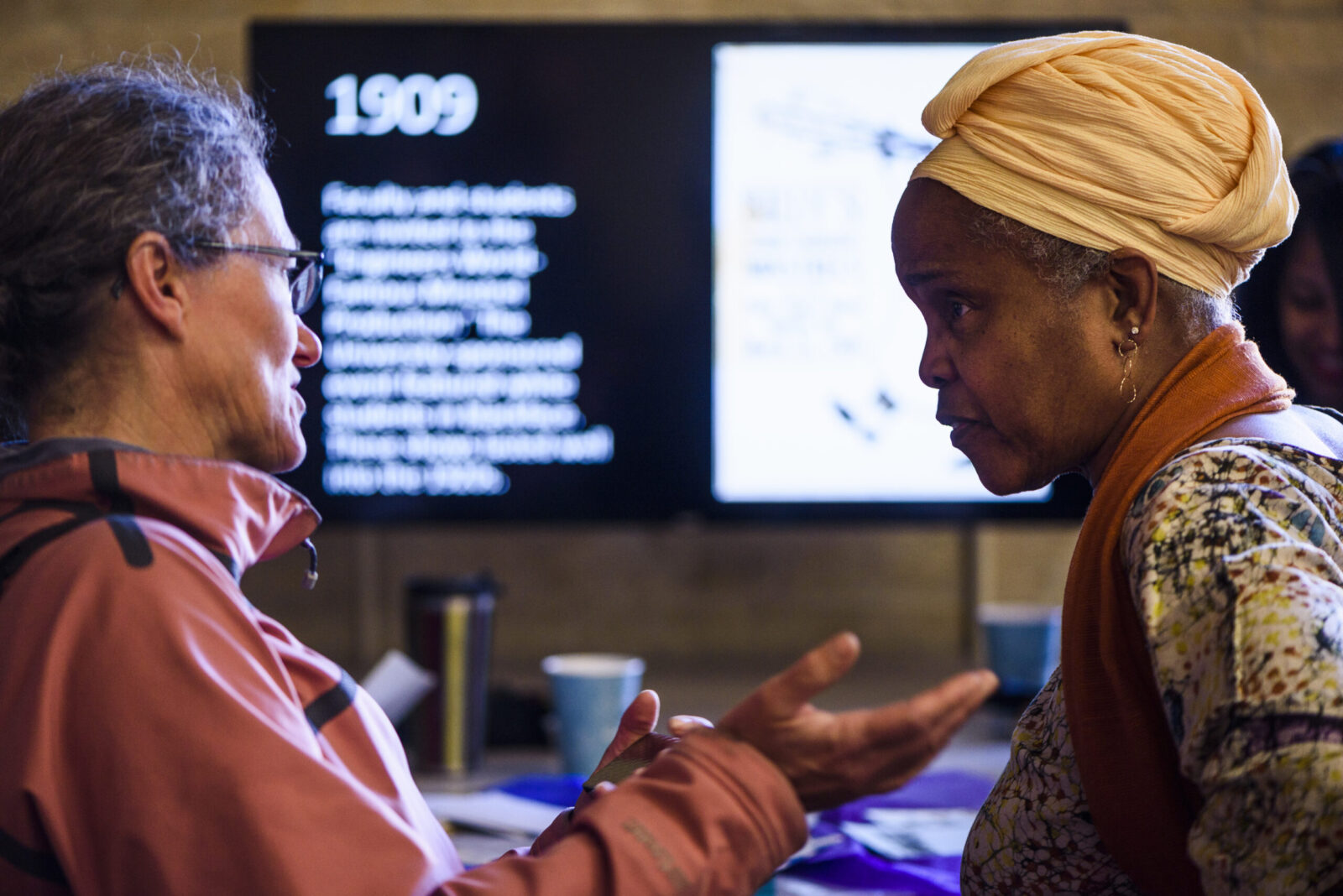 Hazel talking with an advisor.